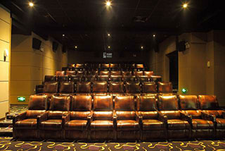 Before building a cinema, how should the distance between cinema chairs and the screen be measured?