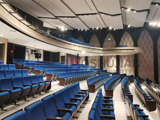 Where should the most comfortable auditorium seats be?