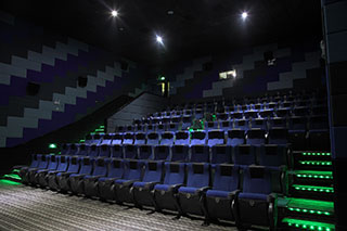 What is the main basis for choosing the color of theater seats?